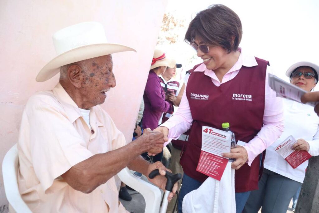 La abanderada de Morena-Verde y PT, Rosa María Hernández dejó en claro que los programas sociales son un logro del pueblo y de la Cuarta Transformación.